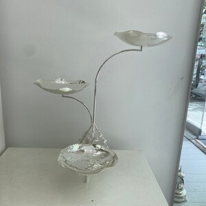 3 different sizes of silver plated cake, cookie and fruit stands.