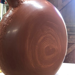 Sienna ceramic vase in the studio.