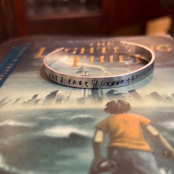 Percy Jackson Hold Fast Brave The Storm Stamped Metal Bracelet