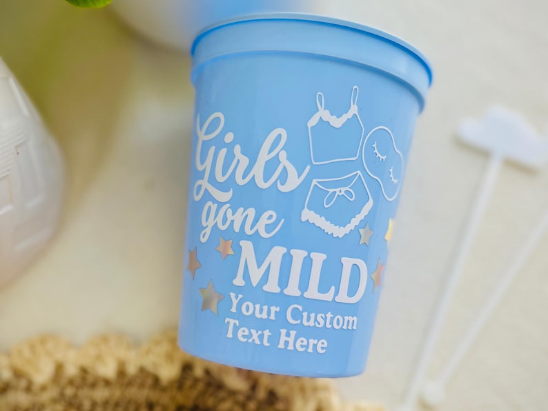May include: A set of three ceramic mugs with a speckled, matte finish. The mugs are in shades of cream, light brown, and dark brown. Each mug has a simple, minimalist design, ideal for coffee or tea.