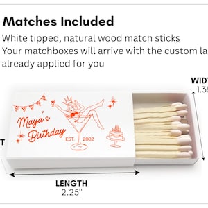 A white matchbox with a customizable matchbox label is shown against a white background. The design on the matchbox showcases a woman in a martini glass, as well as the matchbox dimensions and details about the matches.