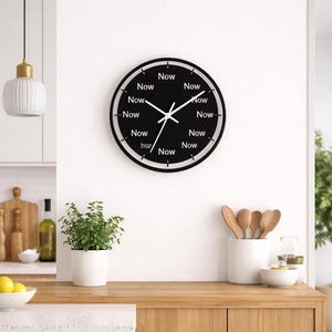 Now Pattern Wall Clock | Repeating Text Modern Black Clock