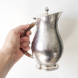 Antique 1900&#39;s WMA Rogers water pitcher or teapot. Antique silver pitcher with woven handle. 1900&#39;s silver pitcher. Antique silver pitcher.