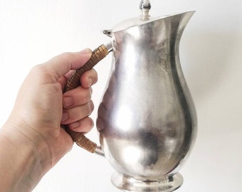 Antique 1900's WMA Rogers water pitcher or teapot. Antique silver pitcher with woven handle. 1900's silver pitcher. Antique silver pitcher.