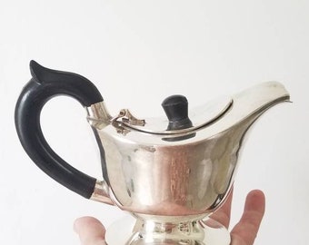 Antique 1940's silver teapot with bakelite handles. Footed silver tea pot. Vintage single serve teapot. Silver gravy or sauce server.