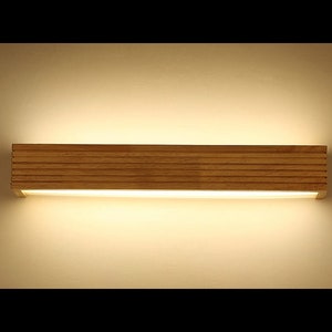 Uniquely crafted wooden wall sconce – Wall lamp.