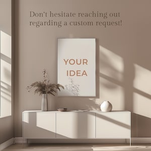 May include: A white cabinet with three drawers sits in a room with a large window. A framed print with the text "YOUR IDEA" hangs on the wall above the cabinet. A vase with dried flowers sits on the cabinet.