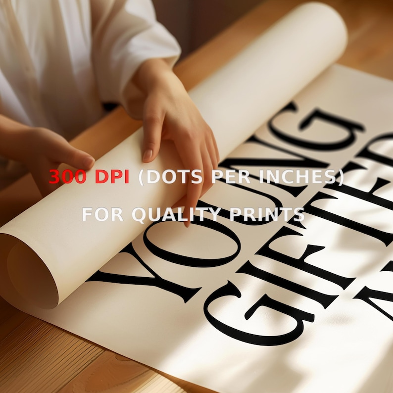 May include: A white poster with black text that reads "Young Gifted and Black" is being rolled up by a hand. The text "300 DPI (dots per inch) for quality prints" is visible at the top of the poster.