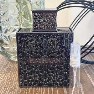May include: A set of three ceramic mugs with a speckled, matte finish. The mugs are in shades of cream, light gray, and dark gray. Each mug has a simple, minimalist design, perfect for coffee or tea.