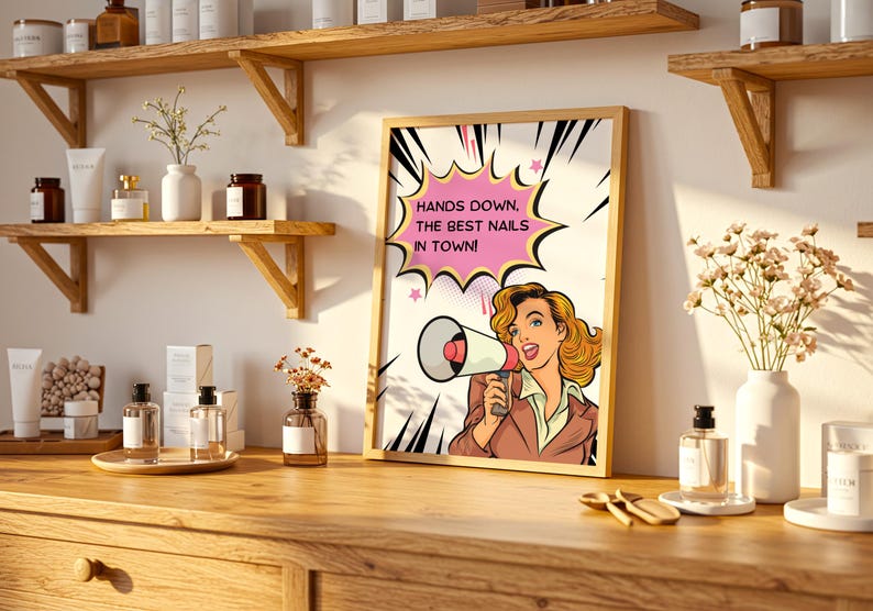 Professional nail salon shelf decor featuring a framed marketing poster. The "Best Nails in Town" sign is placed next to premium nail polish bottles, showing real-life usage. Assertive and fun branding for nail business owners.