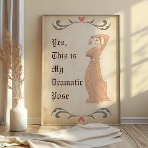 May include: Framed art print with a vintage aesthetic. The artwork features a stylized illustration of a person in a flowing gown, with the text "Yes, This is My Dramatic Pose." Decorative flourishes and hearts adorn the top and bottom.
