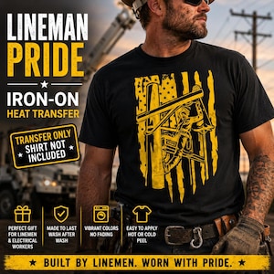 May include: A black t-shirt featuring a yellow graphic of a lineman working on a utility pole, stylized with vertical stripes resembling an American flag. The text reads LINEMAN PRIDE, IRON-ON HEAT TRANSFER, TRANSFER ONLY SHIRT NOT INCLUDED.