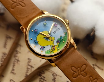 Vintage 1997 Armitron ladies gold-tone quartz watch with Tweety Bird dial