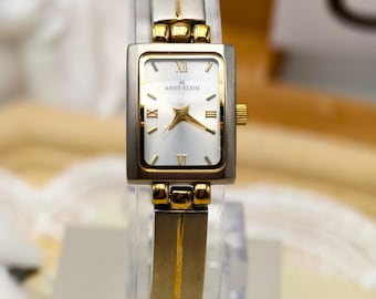 Reloj de cuarzo Anne Klein vintage de los años 90 para mujer, con esfera romana de dos tonos y caja rectangular.