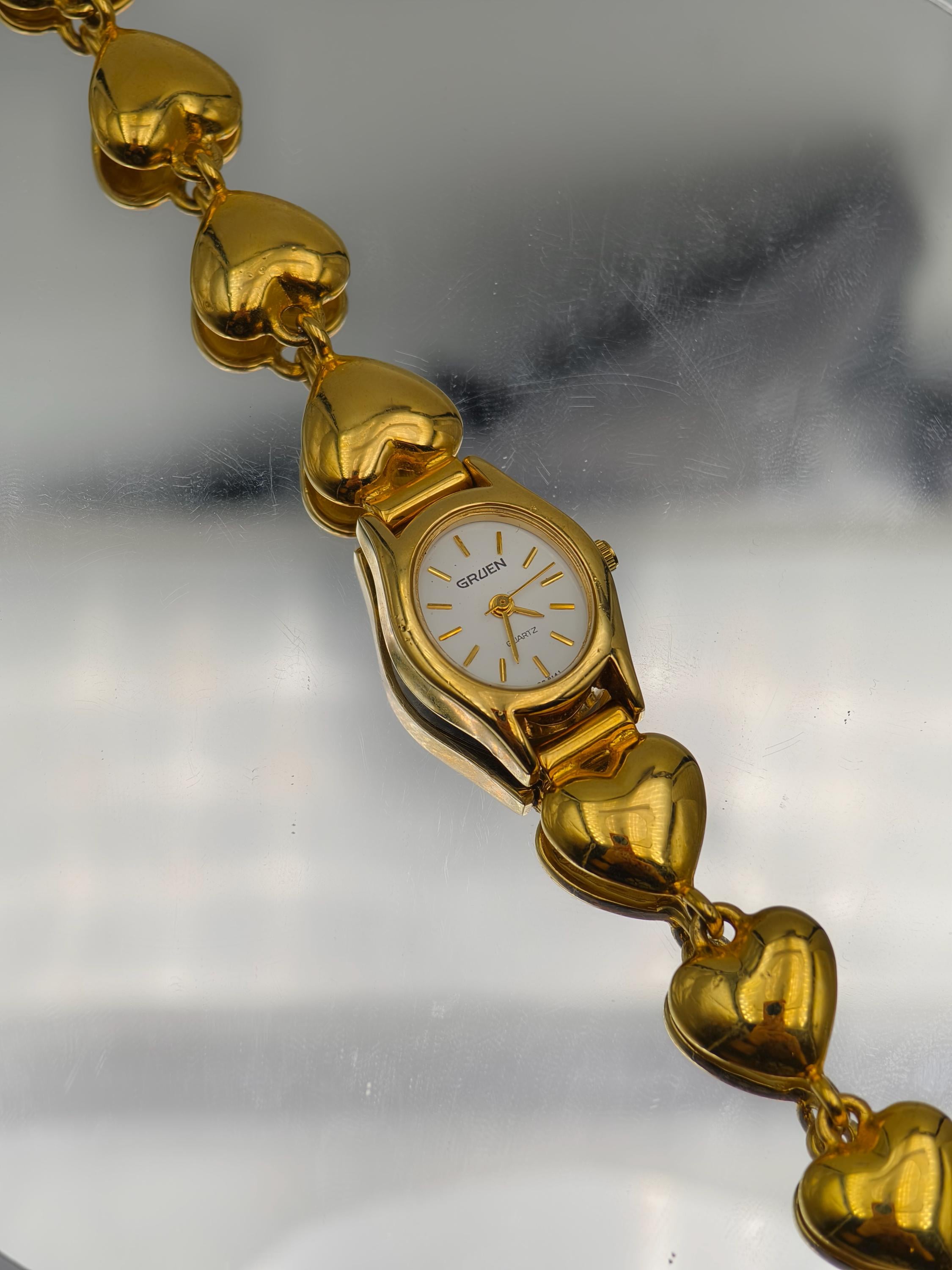 Vintage Gruen Ladies Quartz Gold Tone Heart Bracelet Watch 