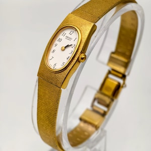Orologio da donna vintage Seiko al quarzo, cassa ovale color oro, bracciale testurizzato, 15,9 mm