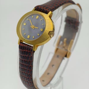 Orologio meccanico da donna Kienzle vintage anni '70, cassa color oro e quadrante grigio