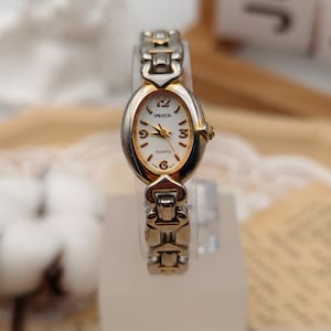 Orologio da donna Sasson bicolore al quarzo, cassa ovale, vintage anni '90