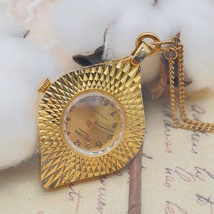 Vintage 1960s Ranatron Ladies Mechanical Pendant Watch Gold Tone Textured Drop Design