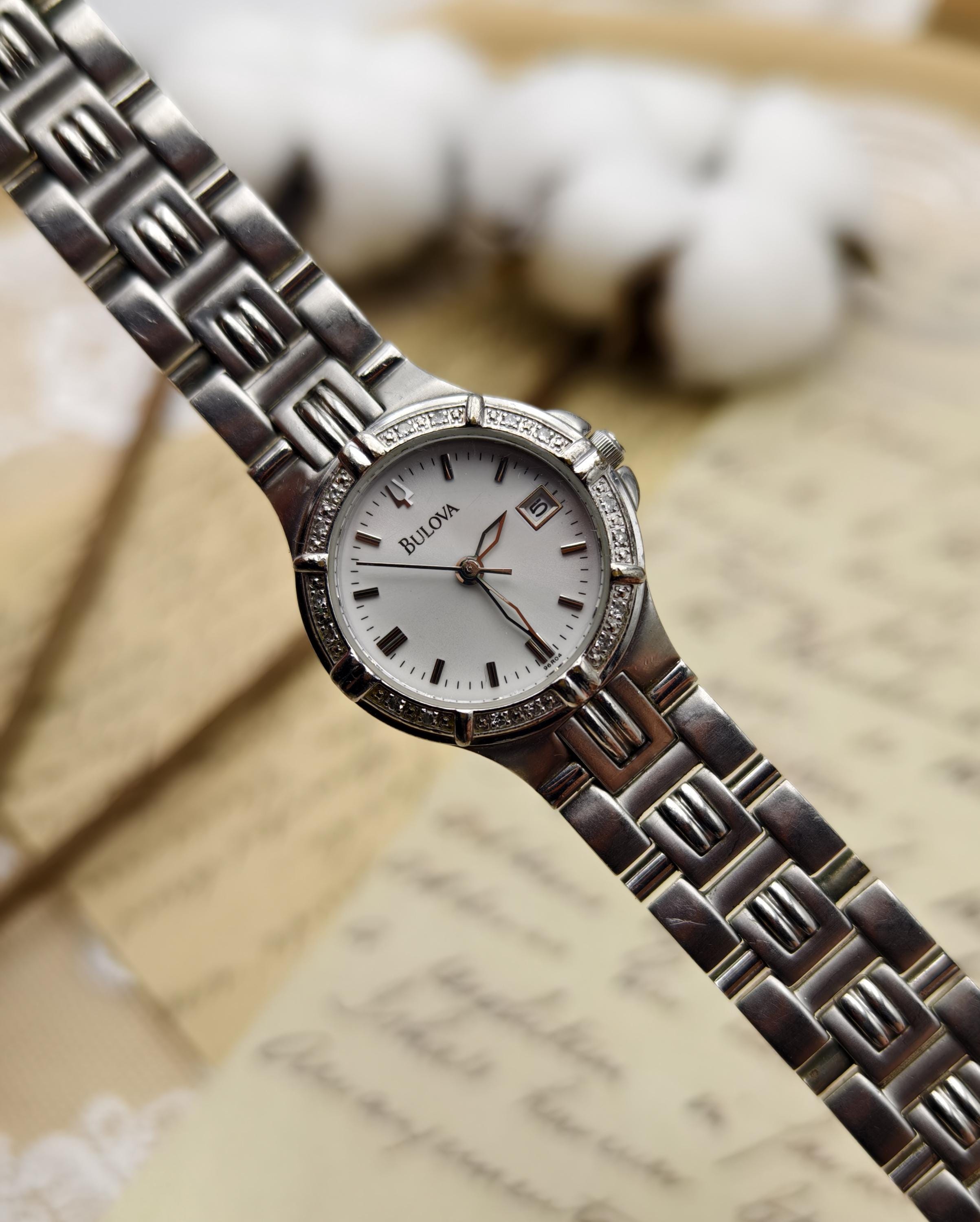 Vtg Caravelle by Bulova Silver Tone White Dial Diamond Accent Women’s Watch 24mm Caravelle By Bulova Watch Womens Silver Tone Rhinestones  main image 2