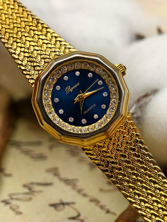 Vintage Pegasus Ladies Quartz Watch Gold Tone Mesh Band Blue Dial Rhinestone Bezel 23mm