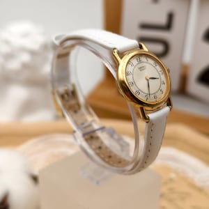 Vintage 1990s Seiko Ladies Quartz Watch Gold Tone Case White Strap