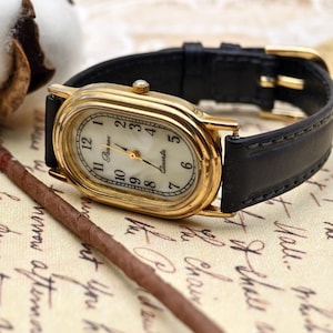 Orologio da donna Parmex vintage anni '90 color oro al quarzo con cassa ovale