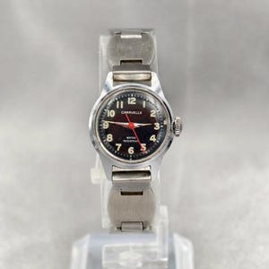 Vintage 1973 caravelle by bulova ladies black dial mechanical watch