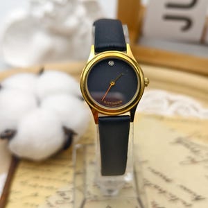Vintage Wittnauer Ladies Quartz Watch 26mm Gold Tone Case Black Dial Diamond Marker