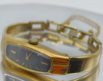 Vintage 1980s Seiko Ladies Mechanical Watch Gold Tone Bangle Oval Dial 14.7mm