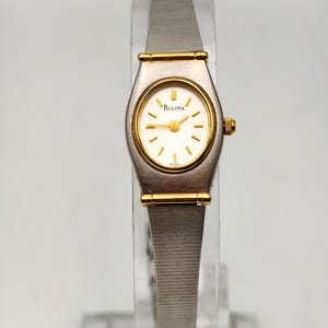 Vintage 1980s Bulova Ladies Quartz Two-Tone Watch Silver Gold 16.3mm