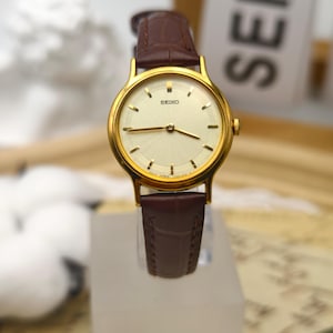 Vintage 1990s Seiko Ladies Watch: Gold Tone, Champagne Dial, Brown Strap
