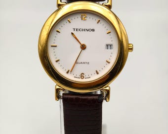 Vintage Technos Damen-Quarzuhr aus den 1990er Jahren, goldfarbenes Zifferblatt mit weißem Zifferblatt, 31,5 mm