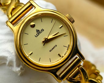 Vintage Lorus goudkleurig dameshorloge met X-Link-armband