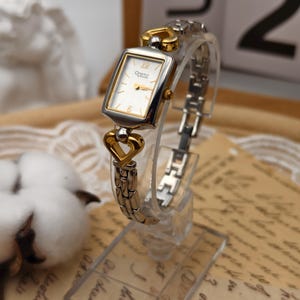 Vintage 1990s Caravelle by Bulova Ladies Quartz Two-Tone Watch Heart Lugs