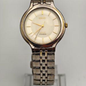 Vintage Seiko Dolce Ladies Quartz Titanium Watch 30mm Silver Gold Two Tone Dial
