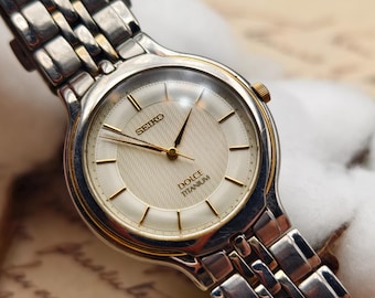 Vintage Seiko Dolce Ladies Quartz Titanium Watch 30mm Silver Gold Two Tone Dial