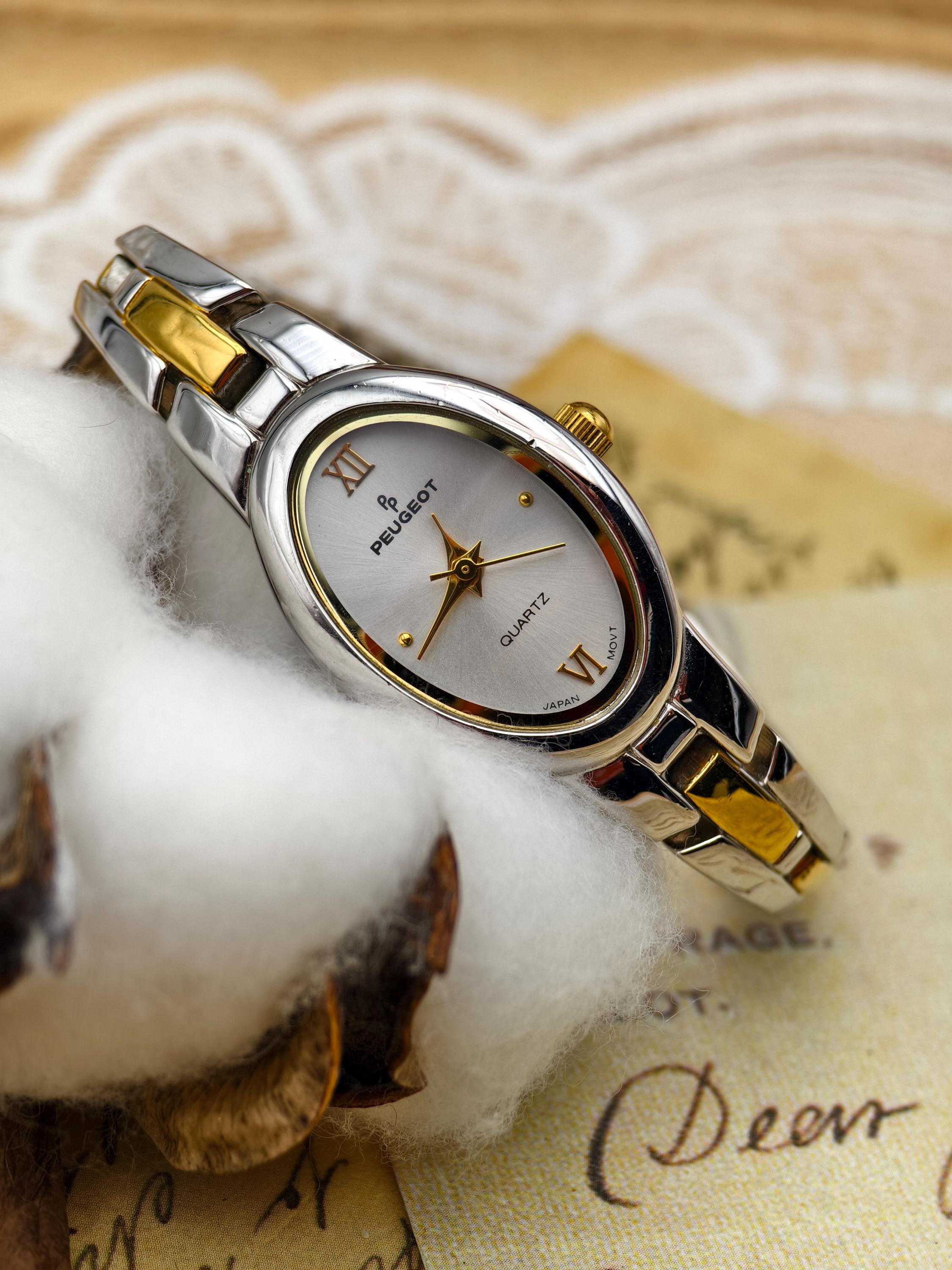 Vintage Peugeot Ladies Two Tone Quartz Watch Oval Dial Japan  display picture 1