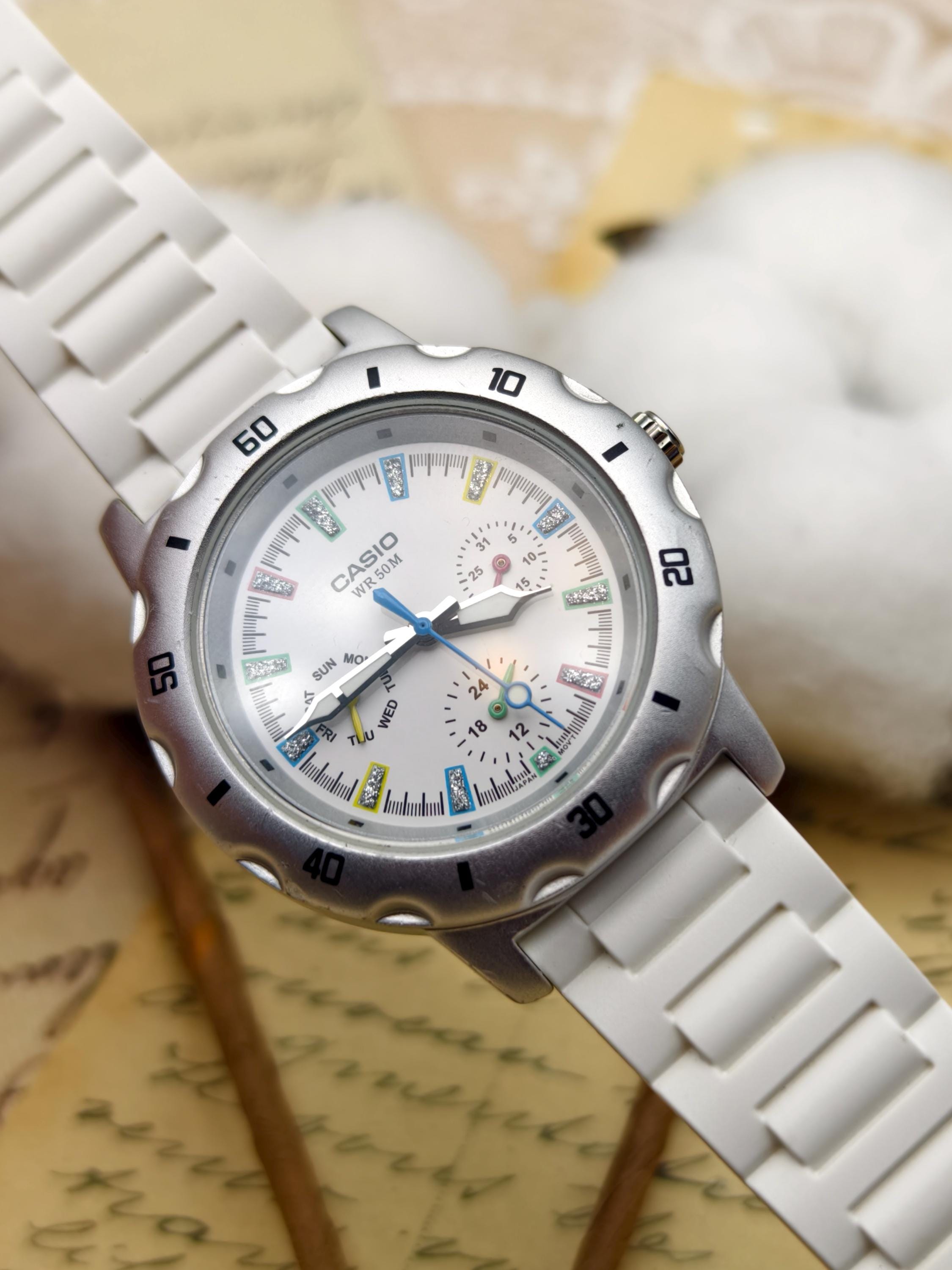 Casio LTP-1328 Ladies Quartz Watch 38mm White Resin Strap Colorful
