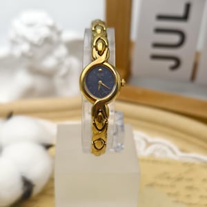 Vintage 1990s Seiko Ladies Quartz Watch Gold Tone Black Dial Twisted Link Bracelet