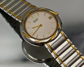 〇Nc左1045 昭和レトロ SEIKO QUARTZ DM303E オレンジ 〇Nc左