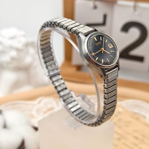 Orologio automatico da donna Seiko vintage anni '70 in acciaio inossidabile, quadrante nero da 24,8 mm