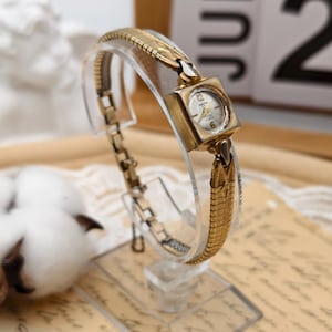 Orologio meccanico vintage da donna Audition color oro, cassa quadrata, cinturino a serpente, anni '50