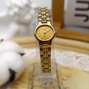 Vintage 1990s Seiko Ladies Quartz Gold Tone Watch 17mm Champagne Dial Bracelet