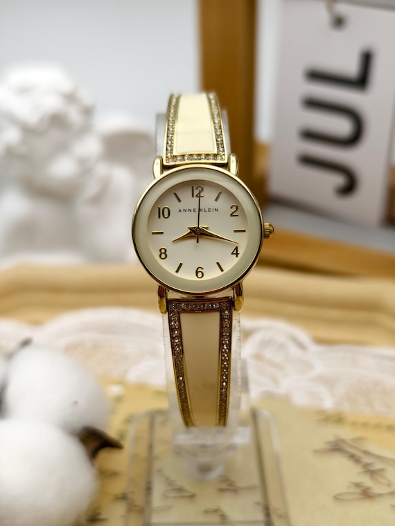 Anne Klein Ladies Quartz Watch Gold Tone Cream Enamel  display picture 2