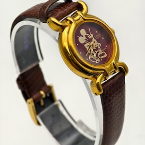 Orologio da donna al quarzo Lorus vintage anni '90 con quadrante rosso color oro di Topolino