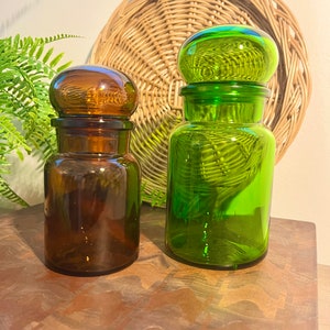 Vintage green and brown Belgian glass apothecary jars with lids