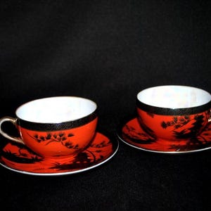 1930 vintage  ,  eggshell  porcelain  , rare , burnt  orange  two  tea set with black landscape  pattern.  By Noritake Morimura Japan.