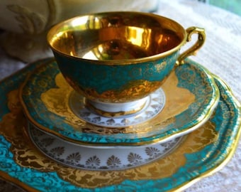 1950 Plankenhammer  Bavarian porcelain tea set: cup, scalloped saucer and salad plate,  gold, teal green color with  mythology  scene