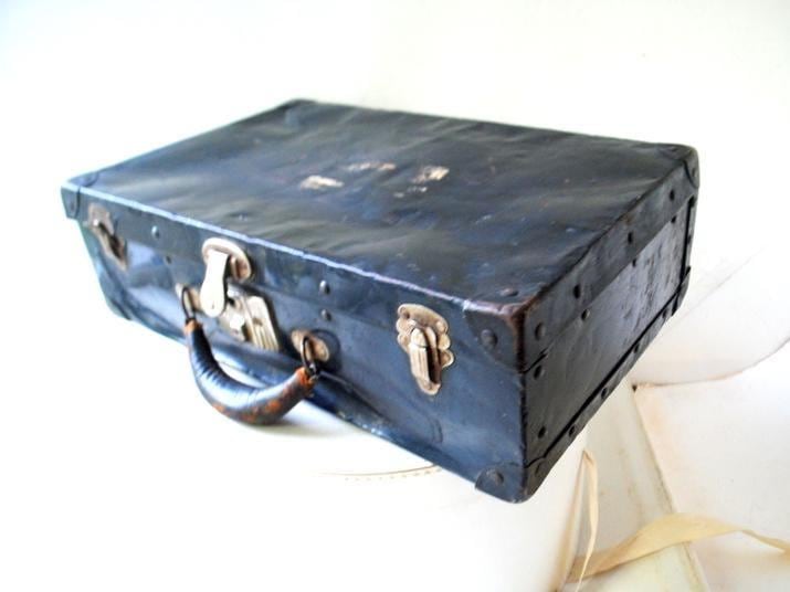 1940 vintage, WWII, rare black metal suitcase with leather, sturdy handle, silver tone metal hardware.